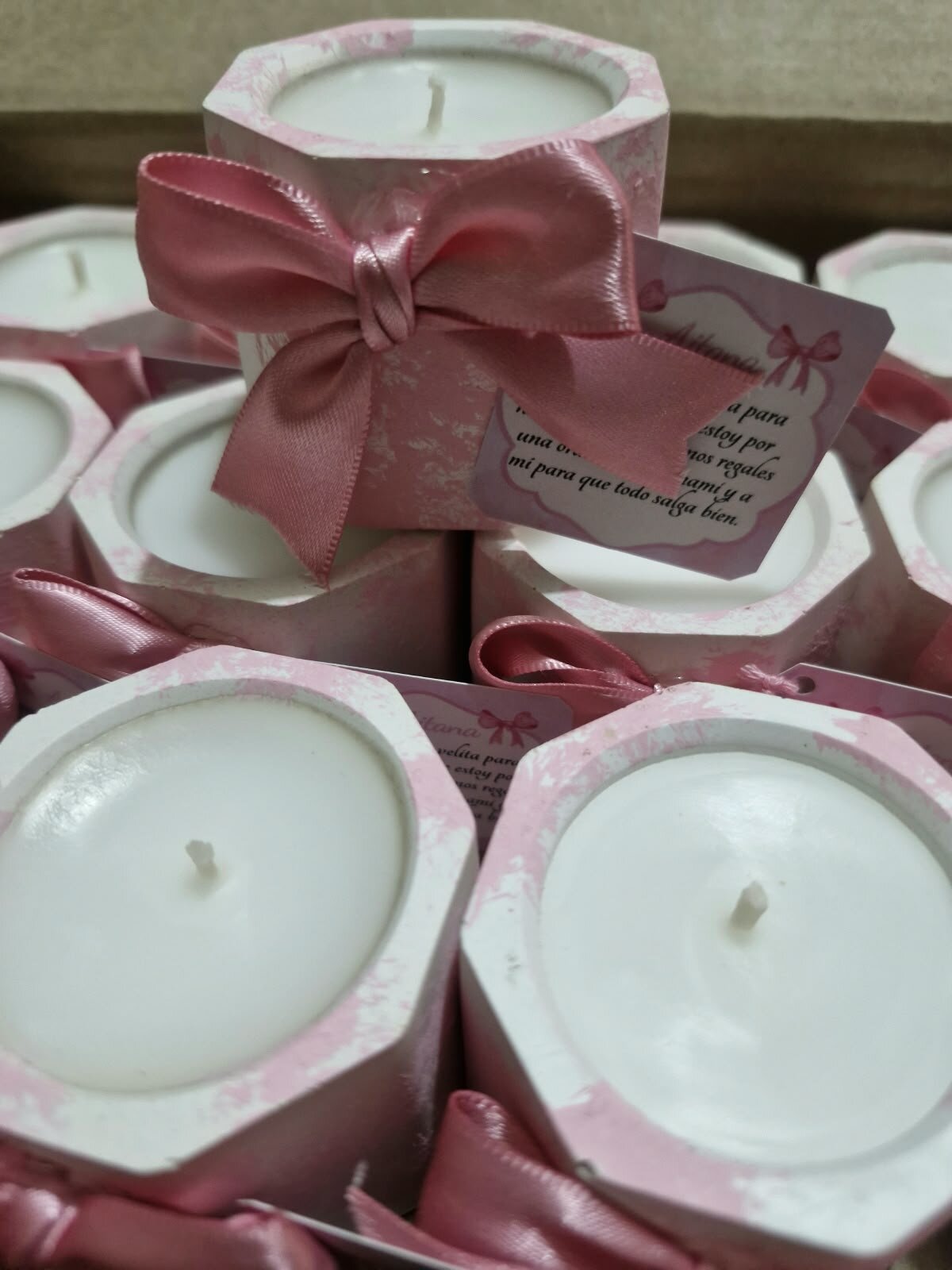 Velas rosas con moño